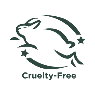 A minimalist dark green illustration of a leaping rabbit surrounded by two stars and curved lines, with the text Cruelty-Free beneath it, representing products not tested on animals.