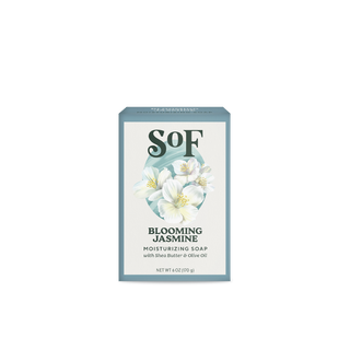A 6 oz Blooming Jasmine Moisturizing Bar Soap with white jasmine flower art. The packaging highlights organic shea butter and olive oil for a rich, moisturizing lather.