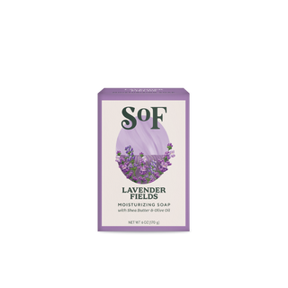 A 6 oz (170 g) paraben-free Lavender Fields Moisturizing Bar Soap, in a lavender box with lavender flower art, contains shea butter, olive oil, and natural colorants.