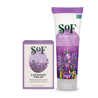 The Lavender Fields Bar Soap and Hand & Body Cream set features lavender-themed packaging with purple flowers and green leaves, both labeled “Lavender Fields.”.