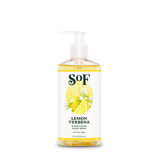 A clear pump bottle of Lemon Verbena Nourishing Hand Wash with sea algae. The label features lemons, lemon slices, and verbena leaves. This SLS-free bottle holds 8 fl oz (236 ml) of yellow liquid.